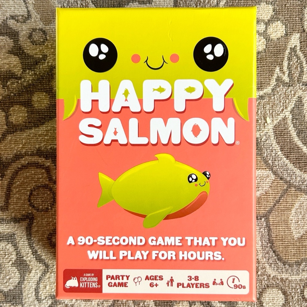 Happy Salmon Card Game by Exploding Kittens. Like new. Cards still sealed.